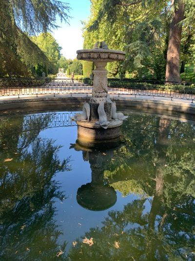 Dolphin Fountain at the El Capricho Palace. Tour Time
